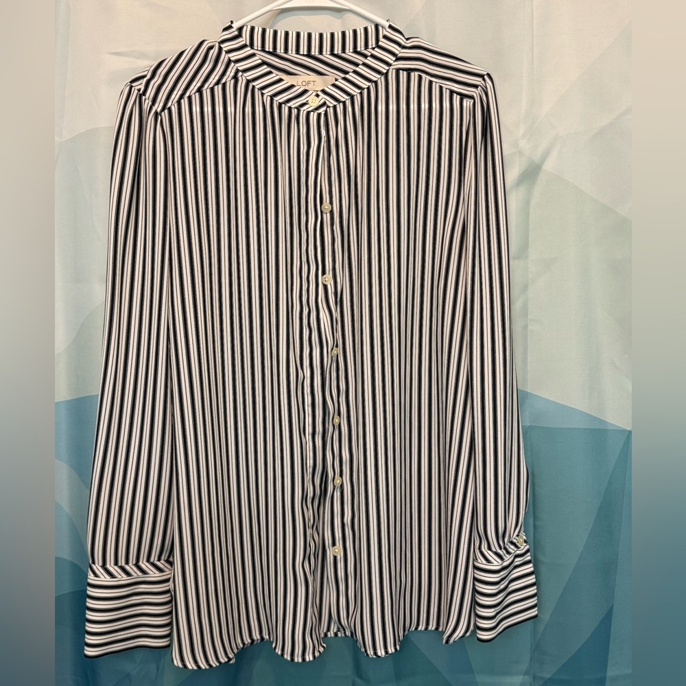 Navy blue and white striped dress shirt.